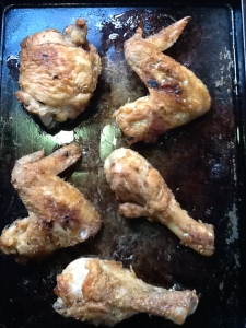 browned chicken on greasy pan